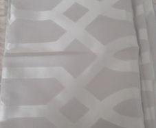 As new Double duvet cover and pillow cases .Taupe /Beigh colour  with  cream /silver  pattern ..Satiny material on the front and cotton on the back .Also double beigh sheet and pillow cases .Only used on a spare bed and washes great dont need to iron  it 