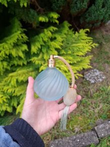 Vintage light blue perfume bottle postage possible