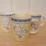 Mugs/Ceramic Mugs (4). .. "Ideal for Shelf Display in a Cafe or Kitchen"  Cream with Yellow and Blue Image 3