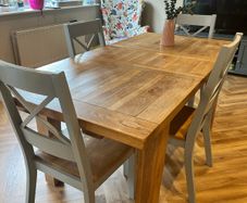 solid oak dining table and chairs
