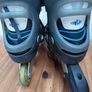 Grey and blue inline skates Image 4