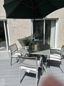 Patio table with Parasol and 4 chairs