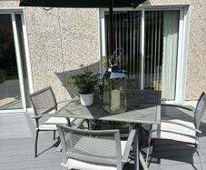 Patio table with Parasol and 4 chairs
