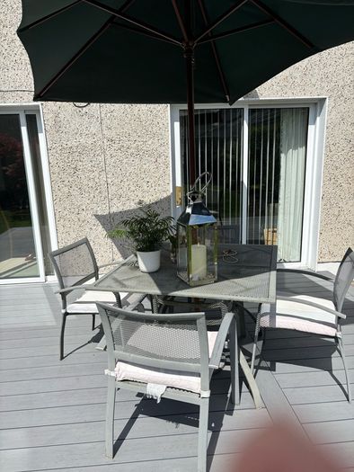 Patio table with Parasol and 4 chairs
