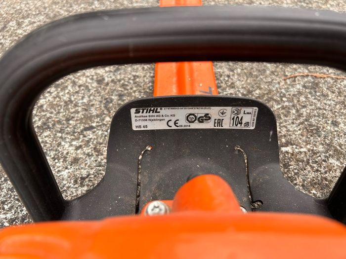 STIHL HS 45 petrol hedge trimmer with 24-inch double-sided cutting blade.