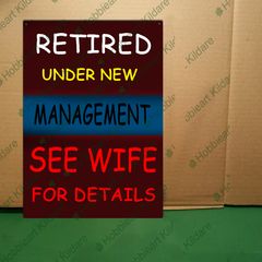 Retired novelty tin metal sign