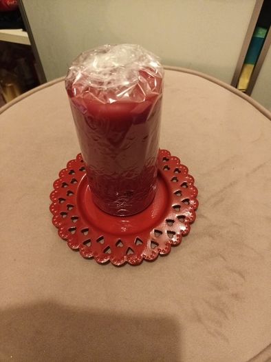 Red candle and plate