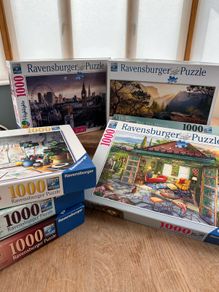 Nine 1000 piece jigsaws (4 sold)