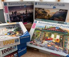Nine 1000 piece jigsaws (4 sold)