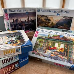 Nine 1000 piece jigsaws (4 sold)