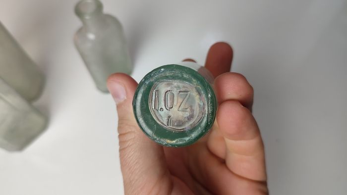 266 - Set of 4 Vintage Universal Medicine Chemicals Clear Glass Decorative Collectible Bottles