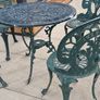 Cast metal garden table and four chairs Image 5