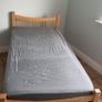 Two Matching Wooden Single Beds: Pine and White Image 4