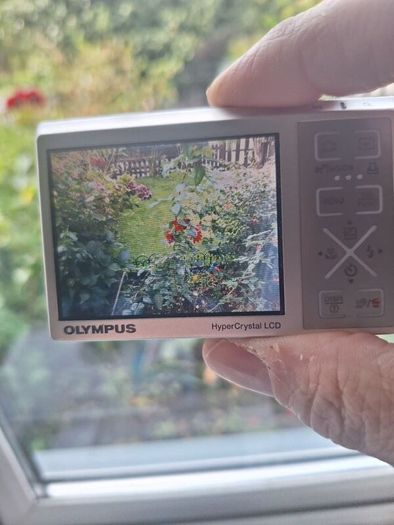 Olympus Stylus 1040 digital compact camera.