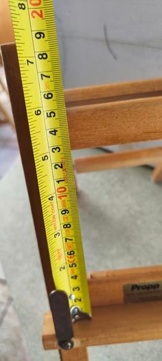 Propp it foldable wooden book holder.