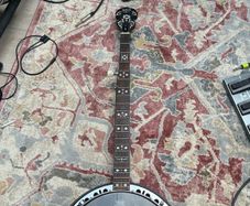 5 String banjo - with picking and sliding capo for high G string.