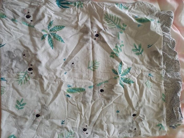 2 x cotbed size duvets from Aldi with sheet and waterproof sheets