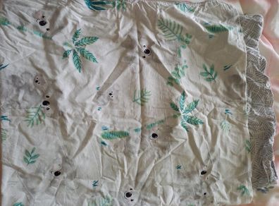 2 x cotbed size duvets from Aldi with sheet and waterproof sheets
