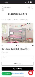 grey bunk beds with mattresss