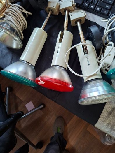 Large Theatrical or Display Lighting, including reflector lamps and colored PAR-style bulbs, with various lamp holders, plugs, and coiled electrical leads all working