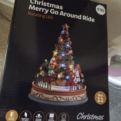 Christmas Light Up Merry Go Round