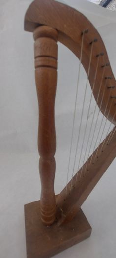 handcrafted wooden display harp ,,lovely display item for any man cave pub restaurant etc etc etc, buyer collects or pays postage.