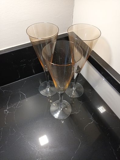 3 champagne glasses