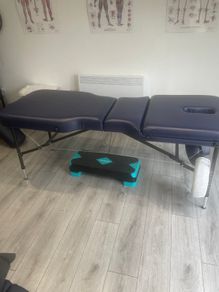Massage table