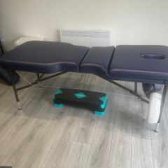 Massage table