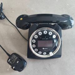 Rotary dialtone telephone