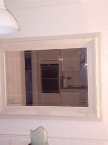 cream antique style mirror