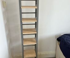 C D rack 114 cms high metal edges with wooden shelves