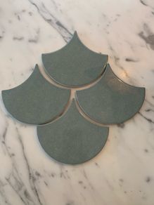 Aqua green tile (fish scale shape). 8 square metres available