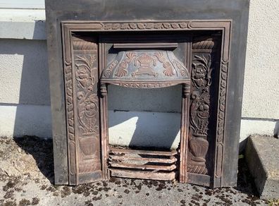 Cast iron fireplace insert