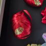 Christmas bows and several rolls of ribbon Image 4