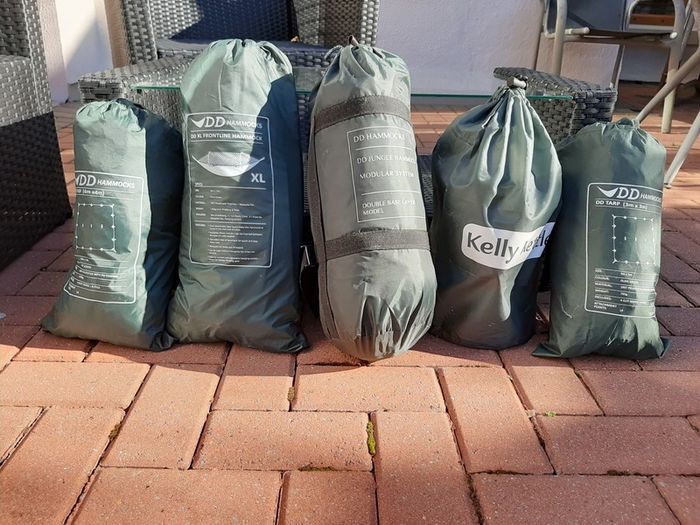 Camping gear for sale .  Tarps are 70 each.  DD Hammock 110 eur