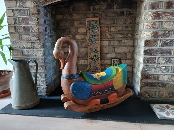 Hand carved rocking swan