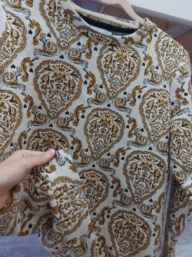 Gold and black design top