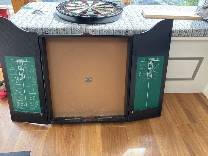 dart board and cabinet