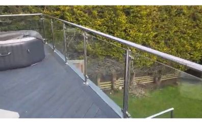 Balcony glass panels and stainless steel posts