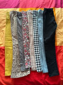 Bundle of 8 pairs of leggings for a girl, size 122cm (6-7 years)