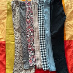 Bundle of 8 pairs of leggings for a girl, size 122cm (6-7 years)