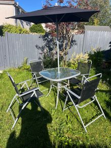 Outdoor table and folding chairs