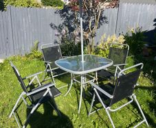 Outdoor table and folding chairs