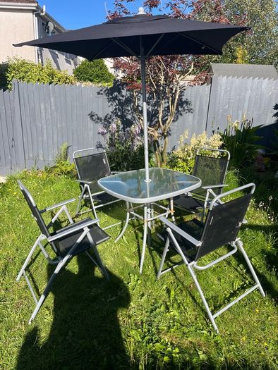 Outdoor table and folding chairs