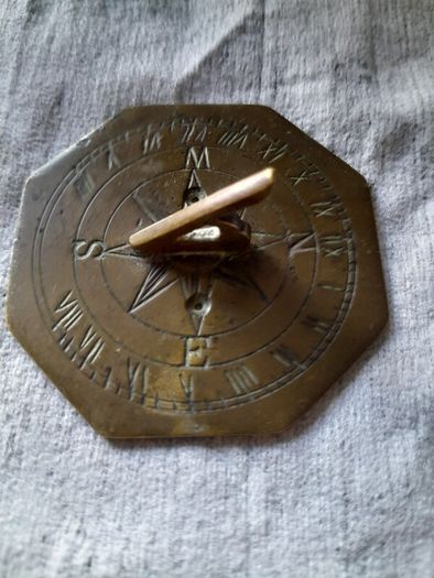 old miniature sundial