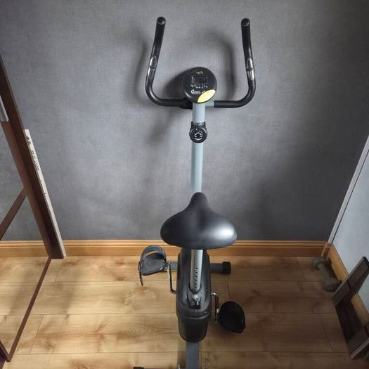 OPTI space saver exercise bike