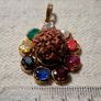 Rudraksha seed pendant with natural precious stones ruby emerald sapphire Image 5