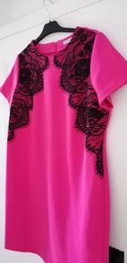Dress size 18 deep pink with black lace detailing zip opening at back