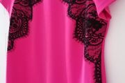 Dress size 18 deep pink with black lace detailing zip opening at back